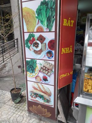 Outside with pictures at Bat Nha 1 Vegetarian Restaurant in Ho Chi Minh City