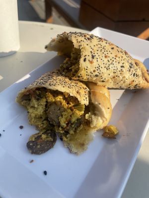 “2nd breakfast” empanada—recommended  at Ada's Technical Books and Cafe in Seattle