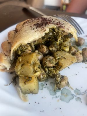 Inside the spice empanada   at Ada's Technical Books and Cafe in Seattle