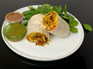 breakfast burrito + spinach side salad (plated at home) at Ada's Technical Books and Cafe in Seattle