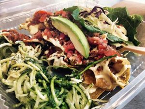 sample plate: zucchini pasta of pesto, marinara and vegan alfredo; vegan nachos; meatless chicken salad wraps at Simply Pure in Las Vegas