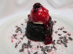 'Cherry Bomb'
vegan and gluten free
chocolate molten cake topped with a vanilla cheesecake creme and cherries at Ellen's Stardust Diner in New York City