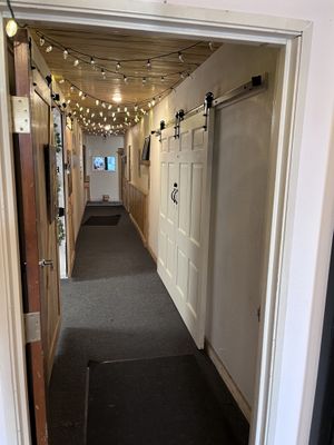 Doors inside (across from tattoo studio)  at Jazz Waffle in Lakewood