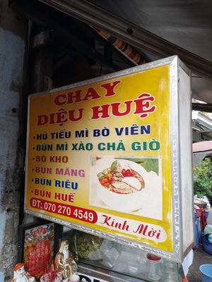 Name. Phone number. Menu.  Outside sign at Diệu Hue in Ho Chi Minh City