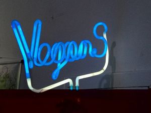 Neon sign inside Lar Vegetariano Vegan  at LAR vegan in Sao Paulo