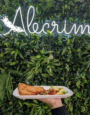 Breaded eggplant, with hummus, sautéed zucchini, salad and pesto. at Alecrim in Vila Real De Santo Antonio