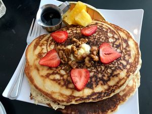HUGE pancakes at Sunday brunch. As good as they look!!  at Higher Taste Plant Based in Long Beach