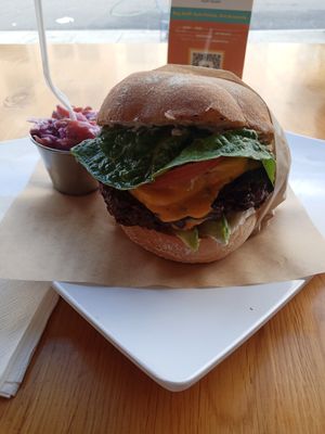 Umm  DIED AND GONE TO HOG HEAVEN MINUS THE HOG. THANK YOU MICHELLE AND CHEF. THE BUN IS ABSOLUTELY PERFECT FOR THIS BURGER RIGHT Amount OF HEAT ..I HAD THE AVACADO JALAPENO BURGER. at Higher Taste Plant Based in Long Beach