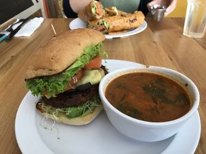 Ahimsa burger with soup of the day. Looks good taste Mediocre :| at Higher Taste Plant Based in Long Beach