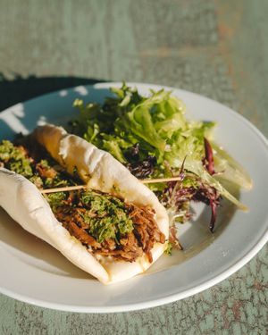 Maitake Shawarma — sandwich with toum, lemon cardamom chermoula, pita (winter 2025 menu) at Corridor in Indianapolis