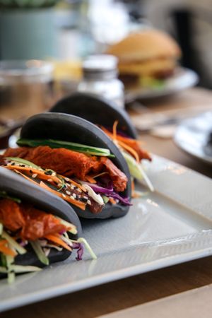 Bao buns- variety of options. This one is Vegan grilled duck, hoisin sauce, cucumber and spring onion. at Kaiaroha Vegan Deli and Eatery in Auckland