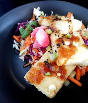 Crispy tofu with Asian sweet sesame dressing at Kaiaroha Vegan Deli and Eatery in Auckland