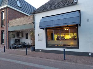 Storefront and small terrace at Restaurant 22  in Bennekom