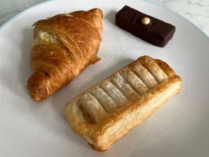 Vegan Apple slice and organic raw snickers with chocolate croissant  at Lu-Ma Cafe in South West London