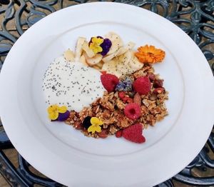 Homemade Granola with coconut yogurt 
Vegan, refined sugar and gluten free  at Lu-Ma Cafe in South West London