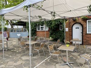 outside at Lu-Ma Cafe in South West London