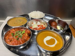 Pure veg thali comes with three different types of Curry desert, Naan bread, and Basmati  rice.  at Ishaan Pure Veg in Schiedam