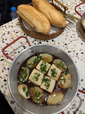 Tofu aubergine and oyster mushroom with fresh bread  at The Banhmi By Kun in Hanoi