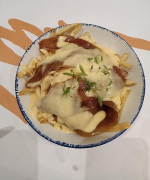 Cheesy bacon fries. at GNOU in Athens