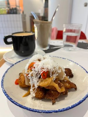 Cauliflower with cheese, pear, peanut sauce and chilli. at GNOU in Athens