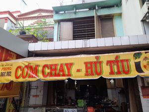 2 items on the menu advertised on a sign at Cơm Chay 390 in Ho Chi Minh City