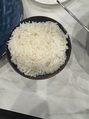 Steamed rice provided with an entree   at Royal Garden Milton in Milton