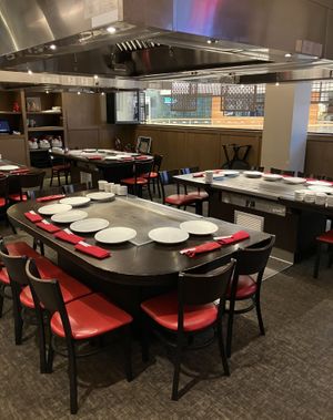 Some of the hibachi grills in the dining area at Benihana - MOA in Bloomington