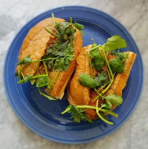 "Miso marinated tofu fried and coated in Choo-Chee curry in a classic banh mi bun with pickled carrot & daikon, cucumber, cilantro & pickled jalapeño" at Little Pig  in Portland