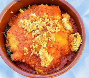 Vegan Enchilada with cashew cheese crumble  at Farmer and The Cook Cafe in Ojai