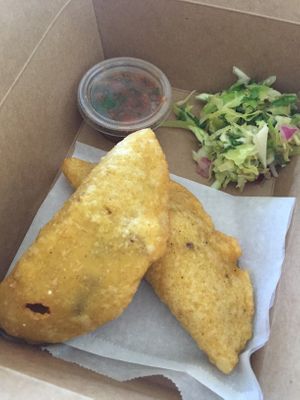 Special: mushroom empanadas. Great with the slaw. Comes with a side of rice and beans. at Farmer and The Cook Cafe in Ojai