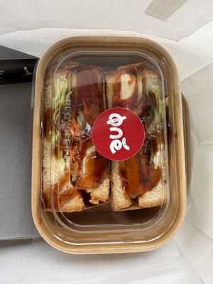 Vegan korean chicken 14,50€ Sandwich with salad, cucumber, carrot Jochujang sauce, mayo japanese sando bread !! you can tell them to make it spicy or not that much  at Oné Toast Bar in Luxembourg City