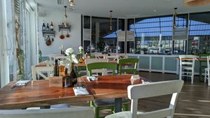 View of the tennis courts inside and outside at Taverna Athos in Leinfelden-echterdingen
