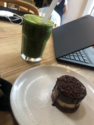 Green smoothie and vanilla choc cheesecake  at Little Bird Kitchen in Auckland