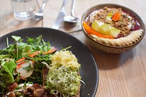 Acai bowl + toast with mushrooms and guac at Little Bird Kitchen in Auckland