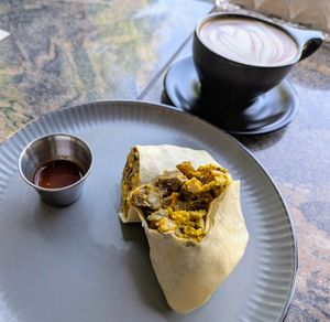 The Breakfast Burrito with a tofu scramble and Beyond Meat sausage and vegan cheese. at Witness Coffee Roasters in Eureka