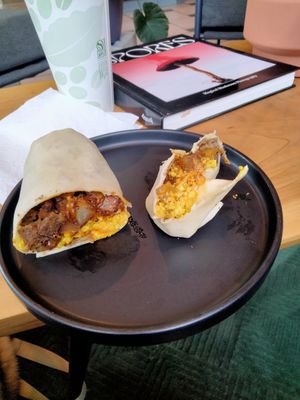 Breakfast Burrito with tofu scramble, impossible sausage and other yummy ingredients. Partly devoured. at Witness Coffee Roasters in Eureka