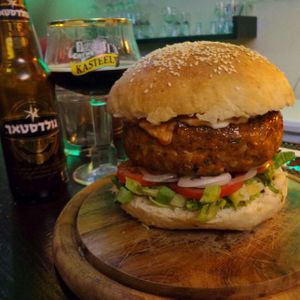The 'Yokozuna' burger. 
A 500 gr (18 oz) seitan-mushroom burger with melted 'cheese' inside the patty. at Green Shack in Tel Aviv