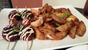 Beet, soy and seitan kebab with home fries. at Green Shack in Tel Aviv