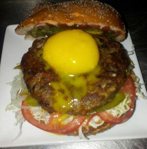 Hamburger with vegan egg  at Green Shack in Tel Aviv