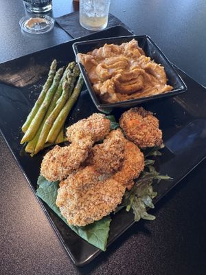Fried shrimp with sweet potato mash & asparagus   at UnbelieVegan in Fairburn