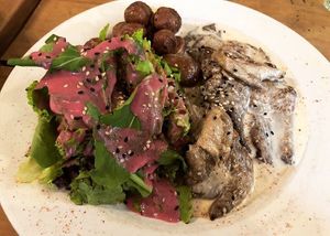 Girgolas grilladas con crema de coco picante  at Bio Solo Organico in Buenos Aires