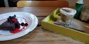 Vegan cake and coconut coffee at Bio Solo Organico in Buenos Aires