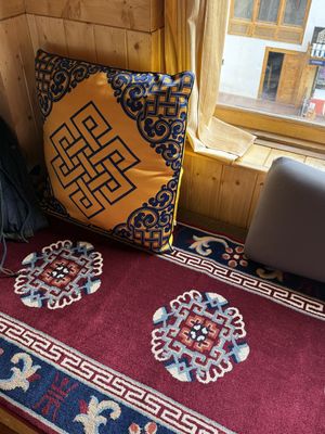 Cozy seats   at Chimath Tibetan Kitchen in Leh