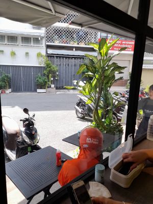 Looking out at Hikari Vegetarian Cafe Q10 in Ho Chi Minh City