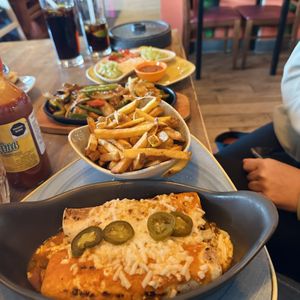 Vegan enchilada, fries, fajita, sauces  at Loco Mexicano in Weston-super-mare
