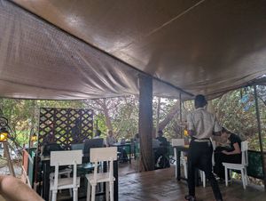 Outdoor seating at Endiro Coffee in Kampala