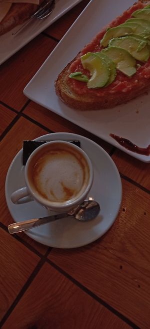 Café soia e tosta de aguacate con tomate. at Cafetería Antoxo in Xove