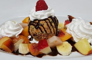 " Tutti Frutti - Veganes Vanilleeis mit Nussummantelung und frisches Obst at Pizzeria Casa Piccola in Vienna