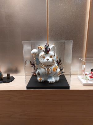Weird Maneki-neko at Kyōto Hyōto Kyōto Ekimae Honten in Kyoto
