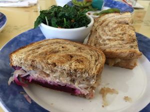 Beet Reuben with vegan ranch dressing and a side of steamed (no oil) kale.  at Cafe Evergreen in Nokomis